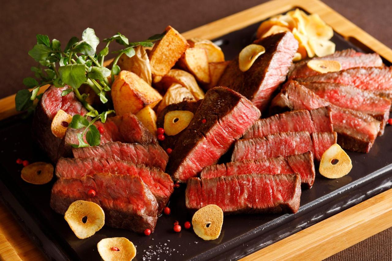 Hotel New Otani Tokyo The Main Екстер'єр фото A steak prepared with the dry-aging technique